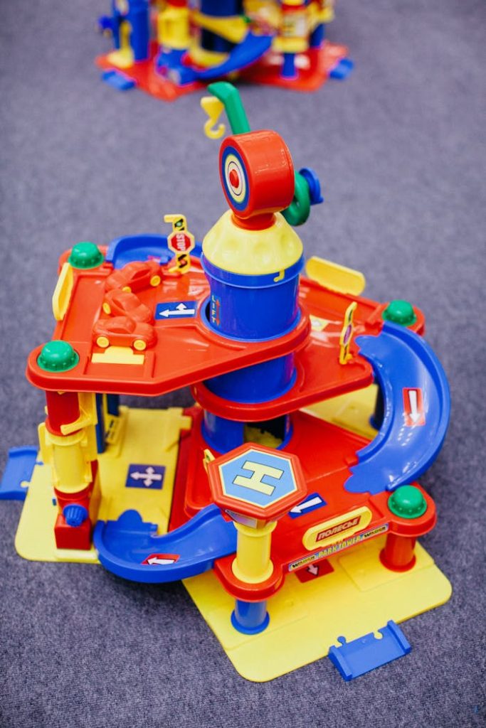 A vibrant toy car garage set with spiral ramps for preschool entertainment.